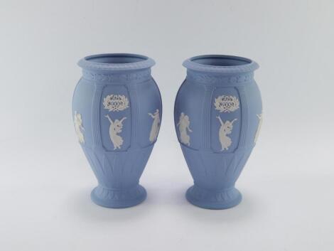 A pair of Wedgwood light blue Millennium vases