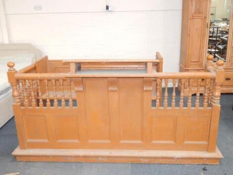 A brown painted chapel pew