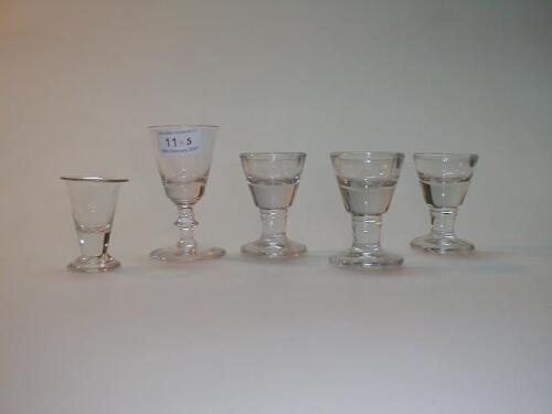 Three penny licks, a 19thC wine with a funnel bowl, knopped stem and slightly