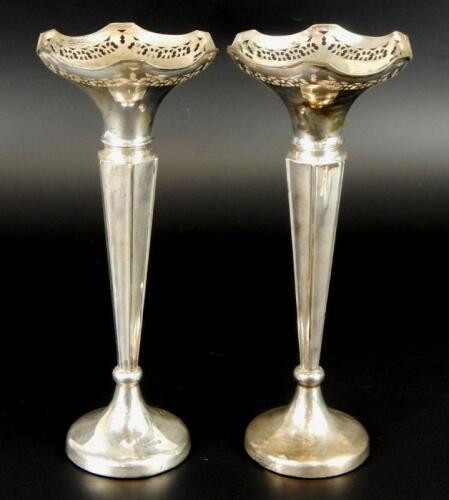 A pair of George V silver fluted stem vases