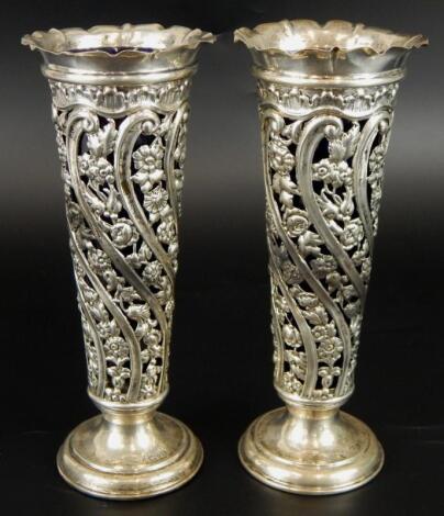 A pair of Edwardian silver specimen vases