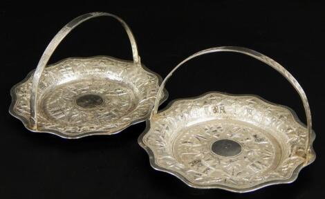 A pair of Eastern white metal dishes