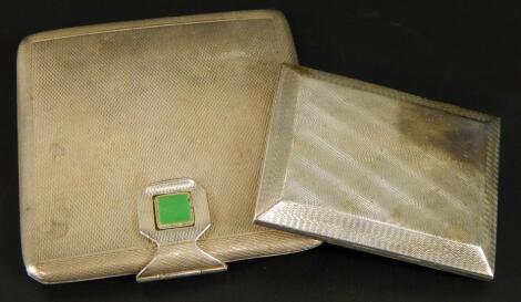 A silver cigarette case and a compact