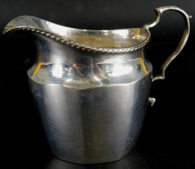A George V silver milk jug