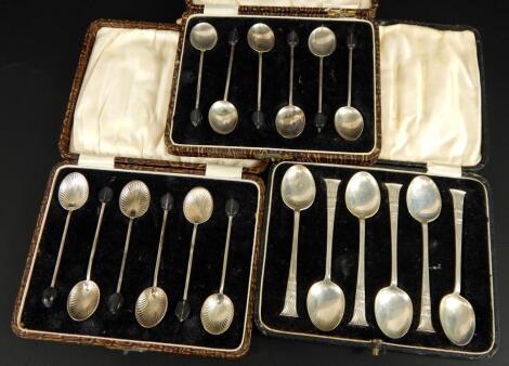 Three cased sets of silver teaspoons