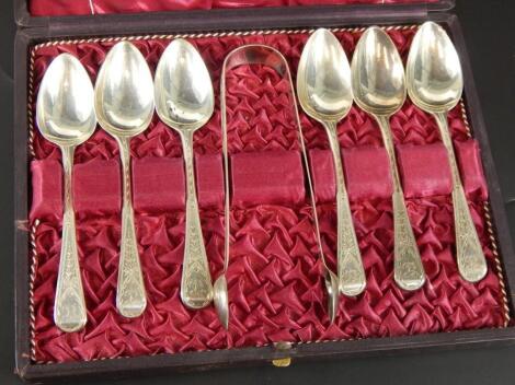 A cased set of silver teaspoons and sugar tongs