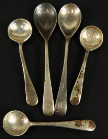 Five various silver mustard and salt spoons. (M)