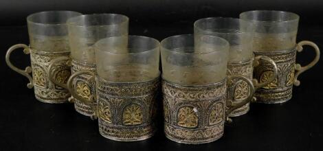 A set of six Continental white metal filigree coffee cup holders