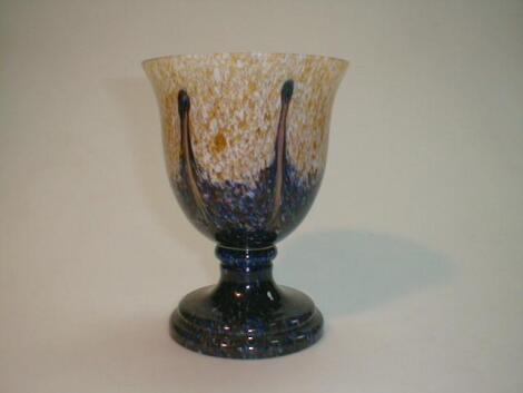 A large mottled glass goblet