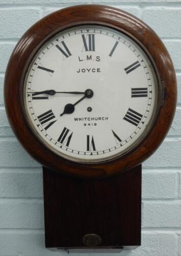 A late 19thC oak and pine railway drop dial wall clock