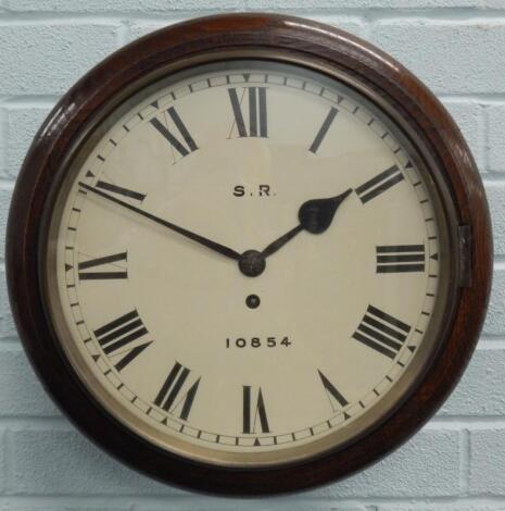 A late 19th/early 20thC oak railway wall clock