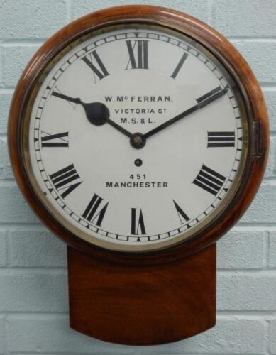 A late 19thC mahogany railway drop dial wall clock