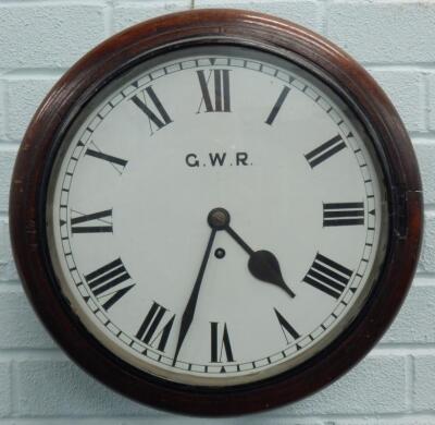 A late 19thC/early 20thC mahogany railway wall clock