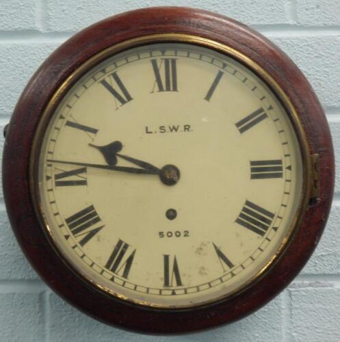 A late 19thC mahogany railway wall clock