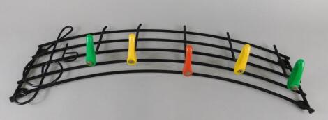 A 1960's retro style metal and plastic coat rack