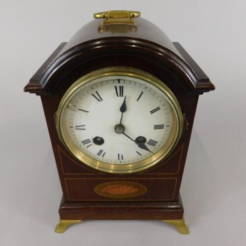 An Edwardian mahogany and marquetry mantel clock