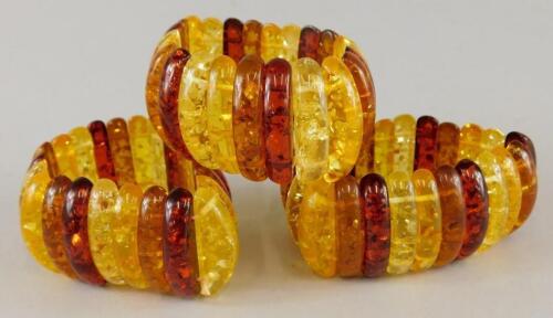 Three modern amber style bracelets