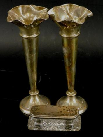 A pair of George V silver bud vases