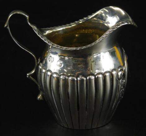 A Victorian part fluted silver cream jug