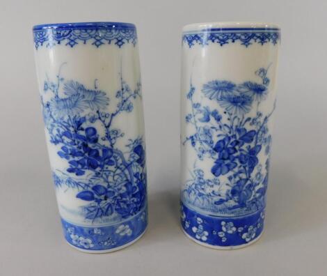 A pair of Japanese porcelain cylindrical vases