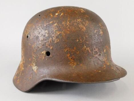 A German Second World War Third Reich metal helmet