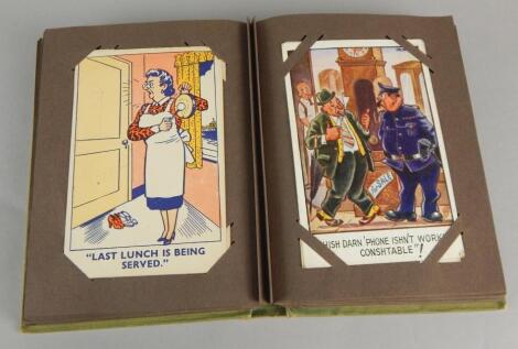 A postcard album containing 100 comic postcards.