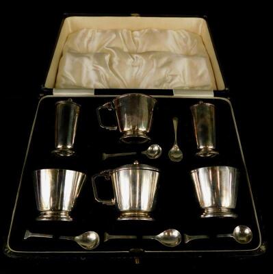A George V silver five piece Art Deco design cruet