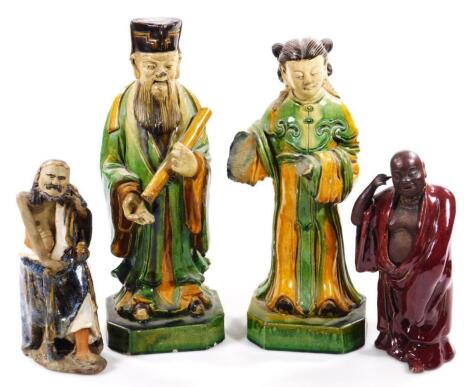 A pair of Chinese pottery Ming style figures