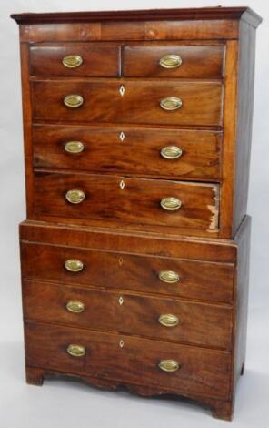 An early 19thC mahogany and pine chest on chest