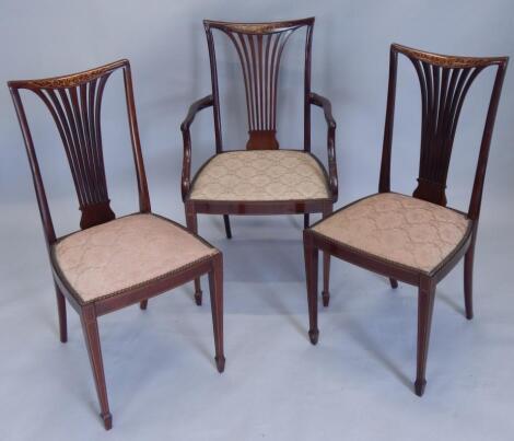 Three Edwardian mahogany and marquetry chairs