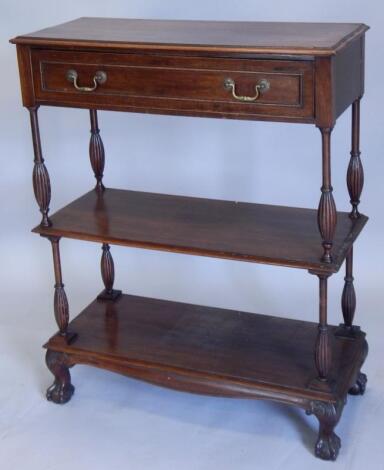 An early 20thC mahogany three tier whatnot or buffet