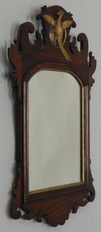 A mahogany fret frame wall mirror in George III style