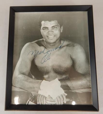 A black and white photograph of Muhammad Ali