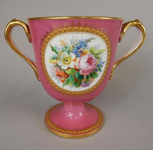 An early Victorian English porcelain two handled loving cup