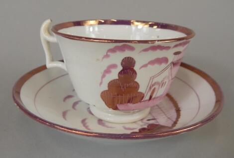 A Victorian Sunderland lustre cup and saucer