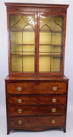 An early 19thC mahogany secretaire bookcase