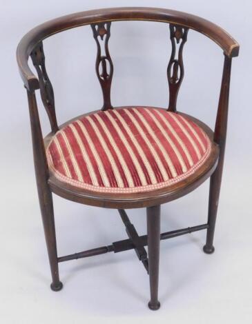 An Edwardian mahogany and boxwood strung tub chair