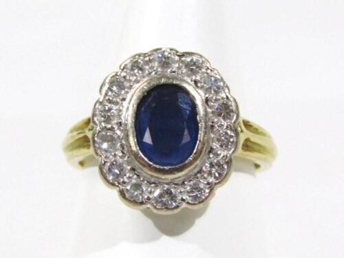 A ladies 18ct gold sapphire and diamond ring