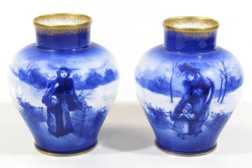 A pair of Royal Doulton vases