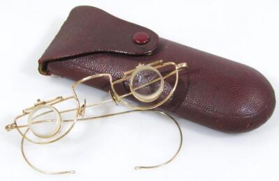 An early 20thC pair of optical spectacles