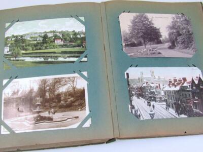 An album of early 20thC and later postcards - 4