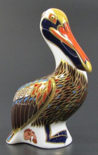 A Royal Crown Derby brown pelican paperweight