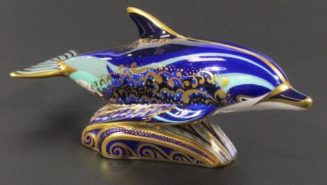 A Royal Crown Derby bottle nosed dolphin paperweight