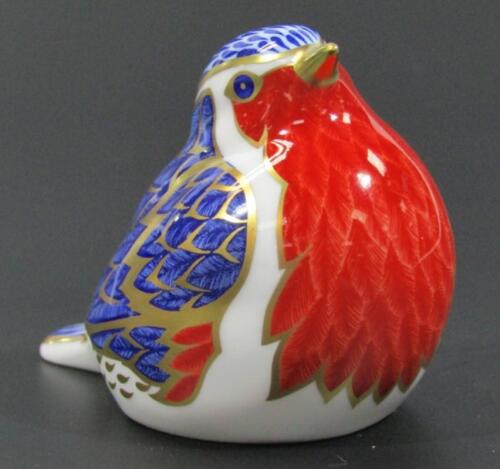 A Royal Crown Derby Robin paperweight