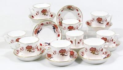 A matched set of nine Royal Crown Derby Barley pattern coffee cans