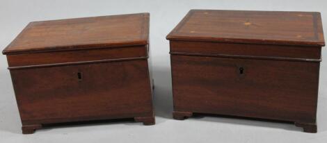 A near matching pair of 19thC mahogany and boxwood strung jewellery caskets