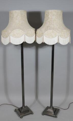 A pair of 20thC Corinthian column standard lamps