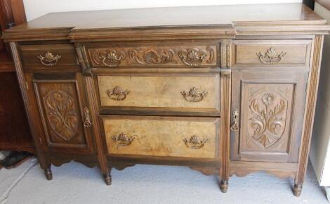 A 19thC walnut breakfront sideboard