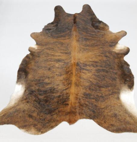 A cow hide rug