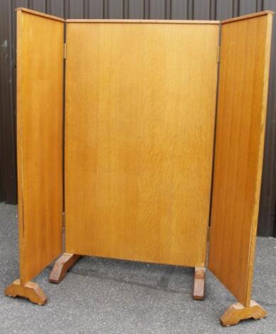 A modern light wood office screen divider notice board